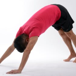 Man in downward facing dog